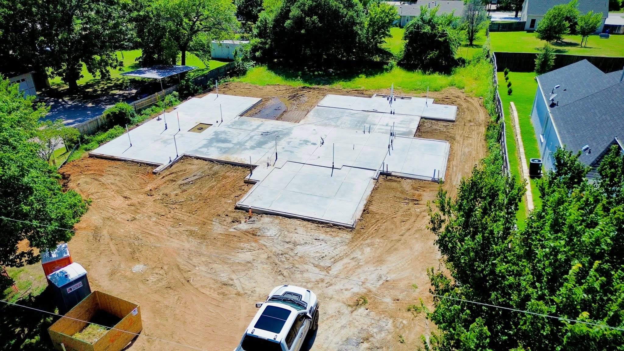 Aerial view of new home foundation under construction